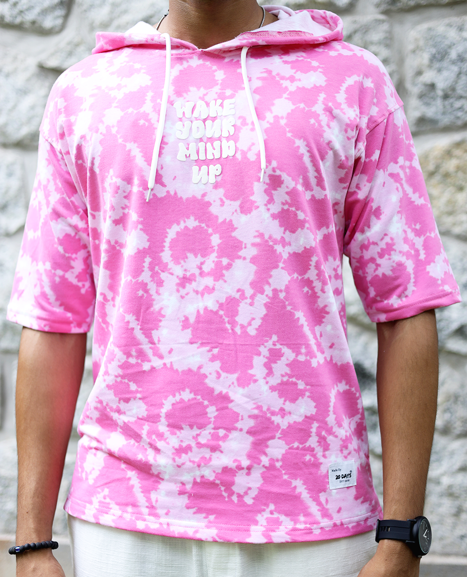 Pink Cotton-Blended Oversized Hooded T-Shirt Features Abstract Dyed Typography Print, Half-Sleeves, and Regular Length
