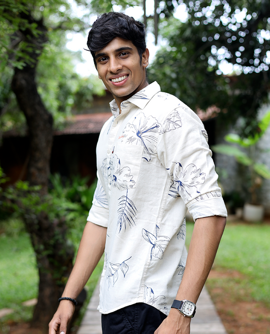 Cream Cotton-Blended Casual Shirt, Enthralled with Tropical Flora-themed Print, Full Sleeves, a Slim Fit, a Spread Collar, and a Regular Length