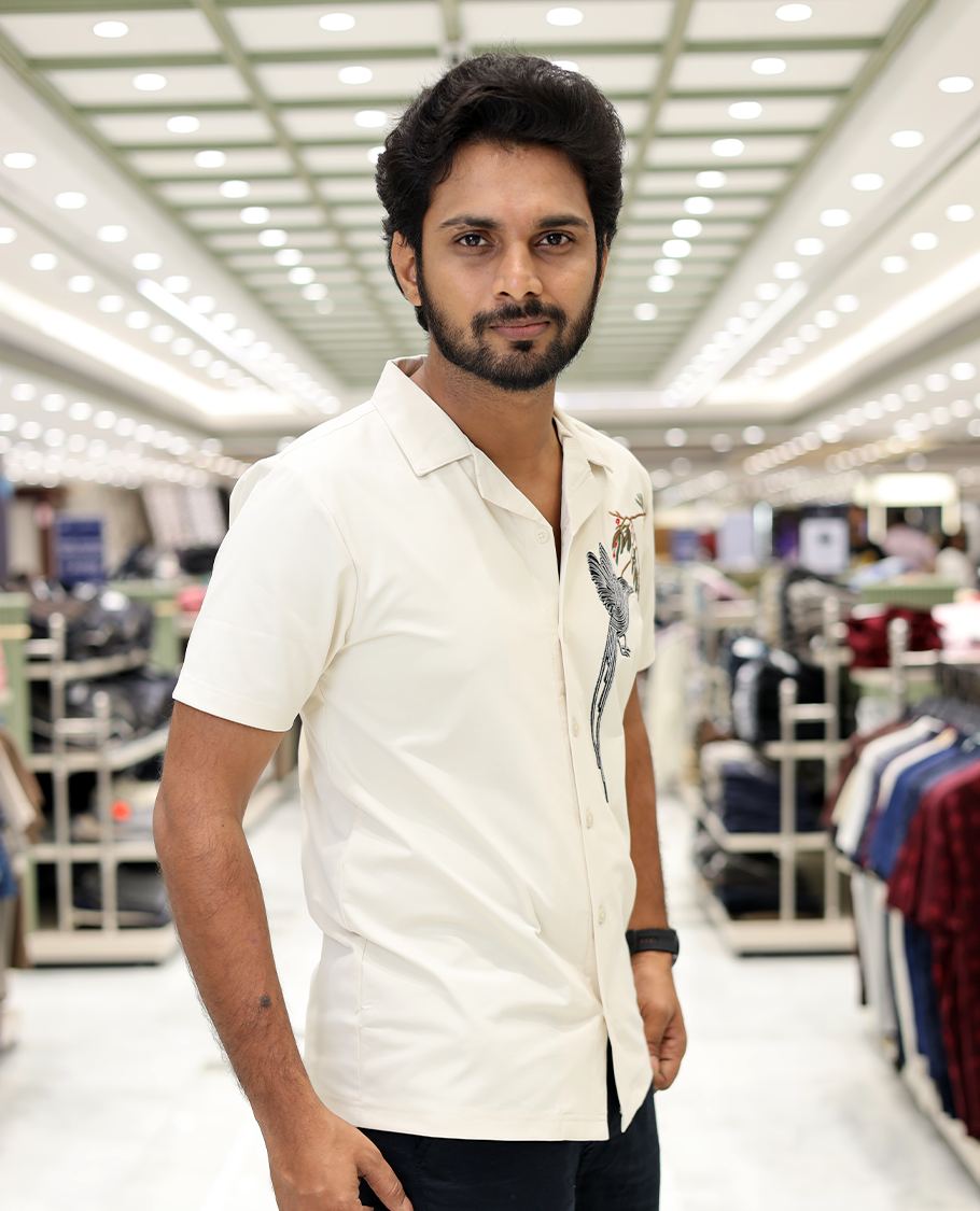Cream Cotton-Blended Casual Shirt Comes with Humming Bird Motifs, Knitted Embroidery, Cuban Collar, Half Sleeves, Boxy Fit, and Regular Length