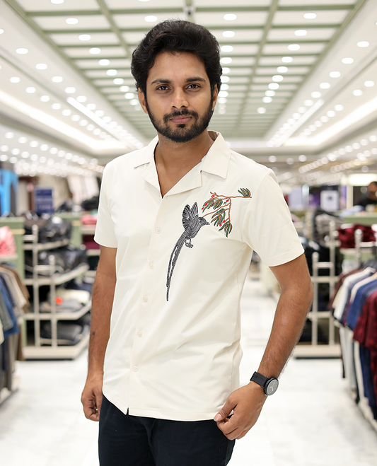 Cream Cotton-Blended Casual Shirt Comes with Humming Bird Motifs, Knitted Embroidery, Cuban Collar, Half Sleeves, Boxy Fit, and Regular Length
