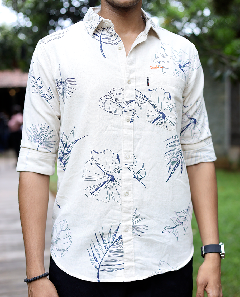 Cream Cotton-Blended Casual Shirt, Enthralled with Tropical Flora-themed Print, Full Sleeves, a Slim Fit, a Spread Collar, and a Regular Length