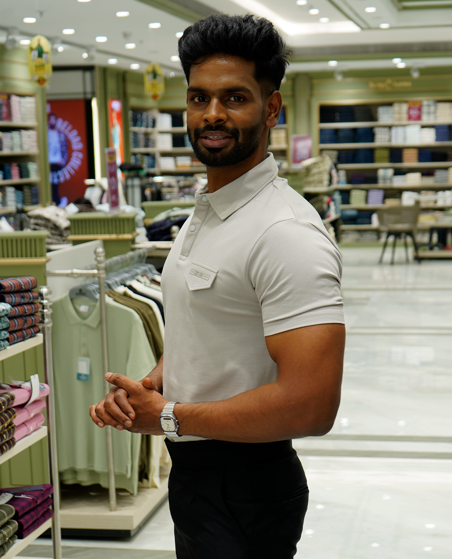 Grey Cotton-Blended Plain T-Shirt Comes with a Polo Neck, Half Sleeves, a Slim Fit, and Regular Length