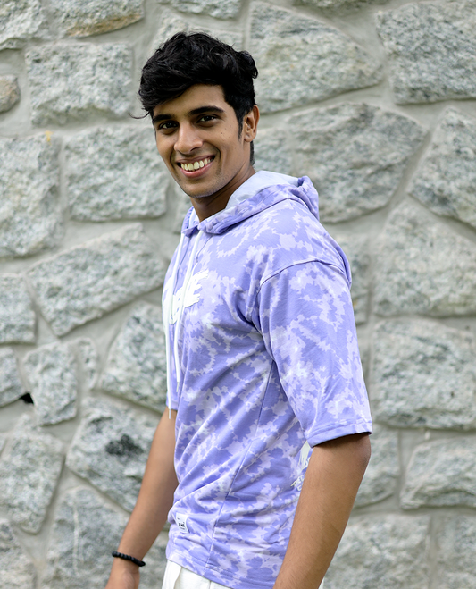 Lilac Cotton-Blended Oversized Hooded T-Shirt Features Abstract Dyed Typography Print, Half-Sleeves, and Regular Length