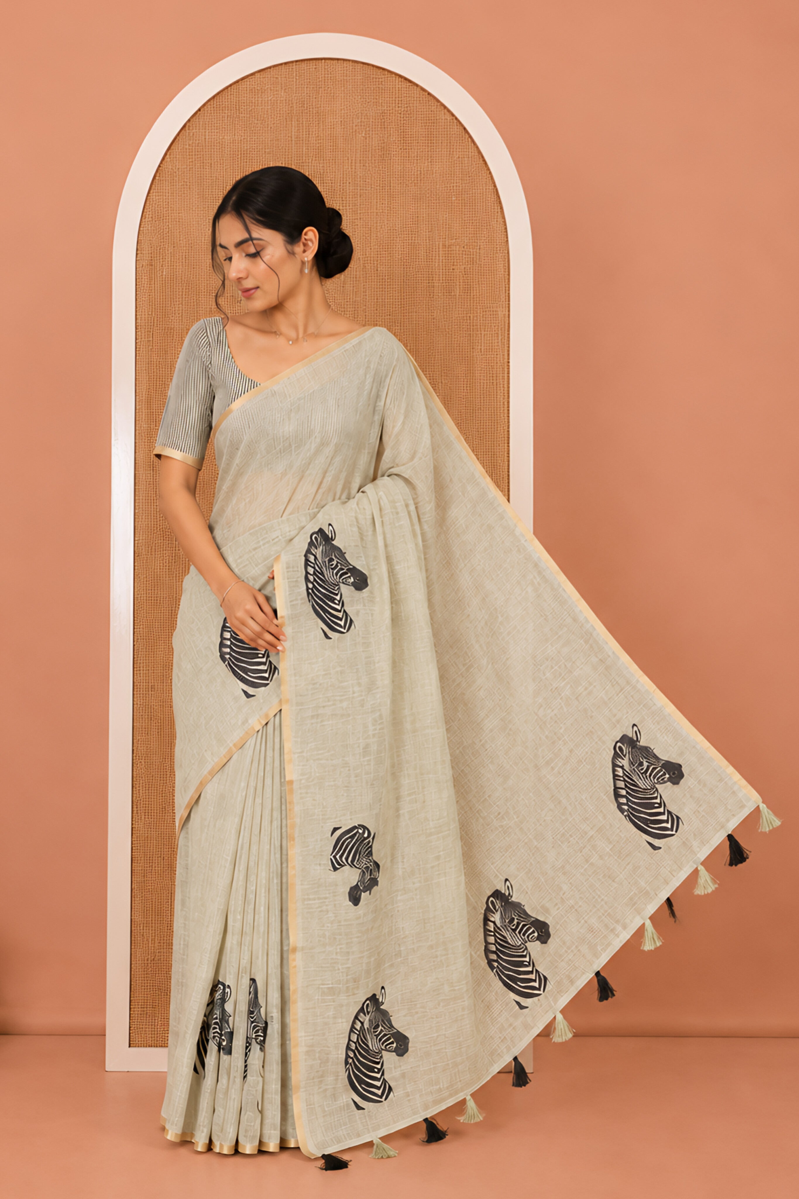 Pista Green Linen Cotton Saree, Accentuated with Zebra Motifs Print, A Subtle Piping Border, Zebra Printed Pallu, and Comes with a Contrast Blouse
