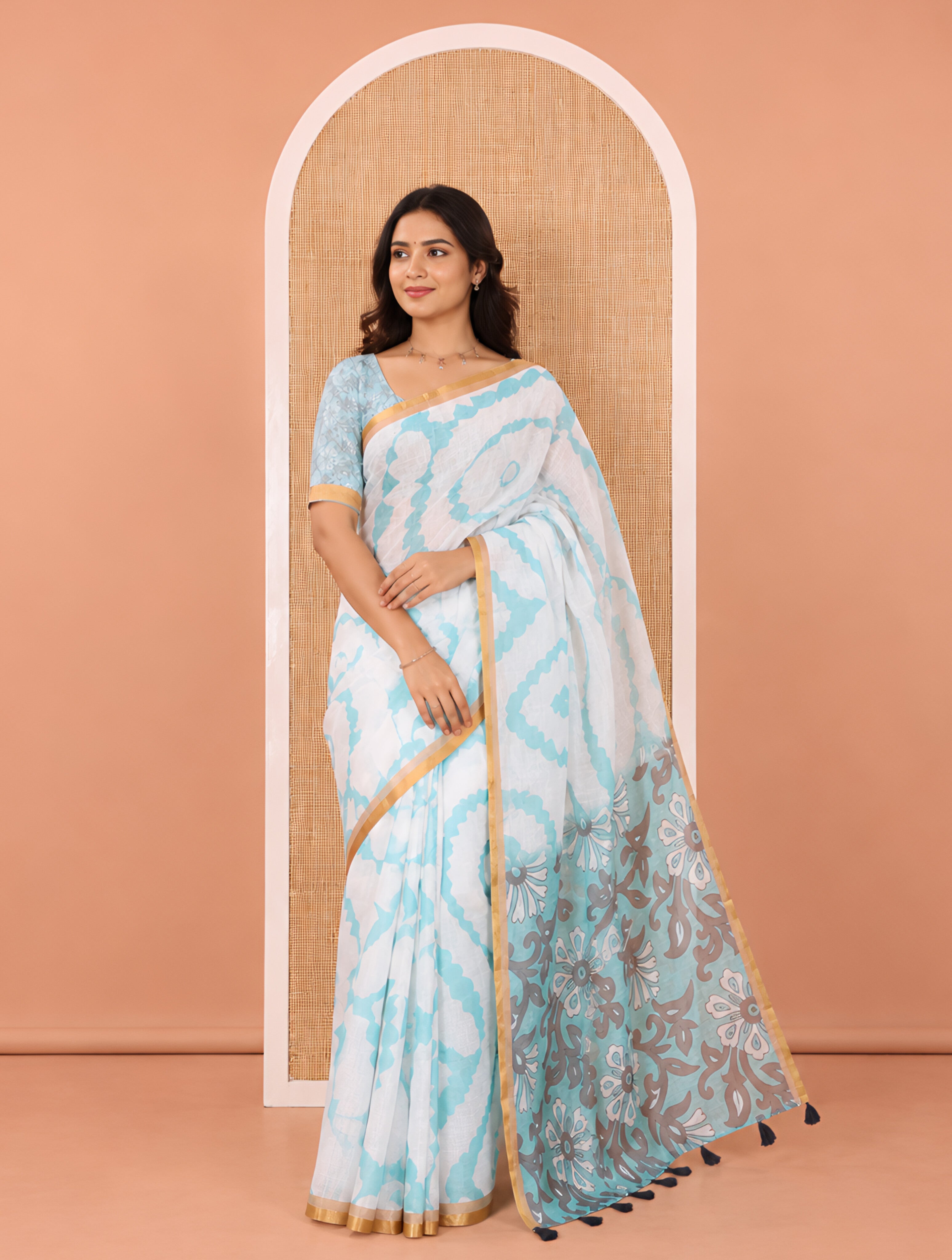 White-Green Linen Cotton Saree, Elevated with Shibori-Printed Body, Highlighted by Piping Border, Floral Printed Pallu, and a Contrast Blouse
