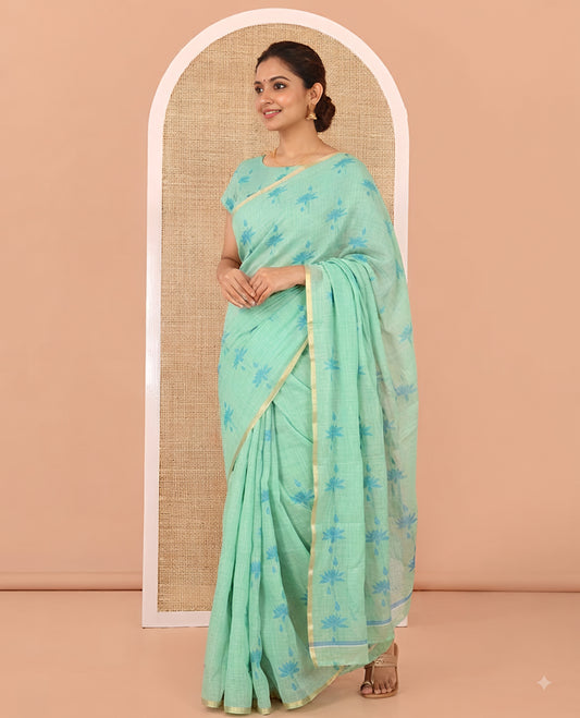 Borderless Green Linen Cotton Saree Features Lotus Print, a Self-Pallu, and a Matching Blouse