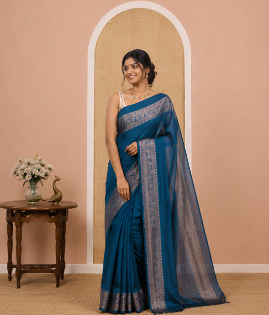 Peacock blue Plain Vichitra Silk Saree Subtly Sparked with Self-Border Featuring Traditional Designs, Plain Pallu, and Comes Without Blouse