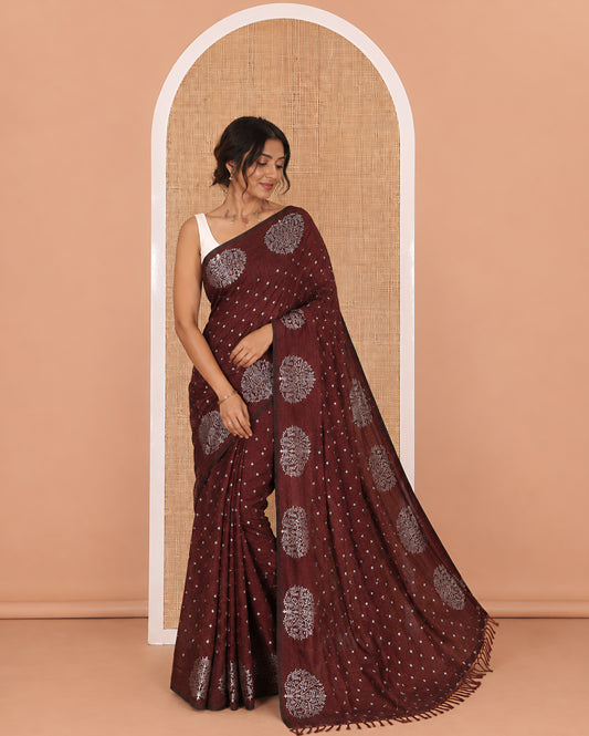 Coffee brown plus buttas woven Vichitra silk saree, kalpavriksha tree motifs woven on its border, self-pallu, and no blouse