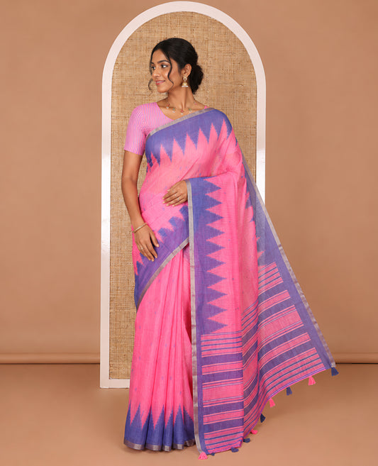 Pink Linen Cotton Saree Delicately Printed with Batik-Style Buttas All Over Its Body, Complemented by a Contrast Temple Zari Piping Border, Striped Pallu, and Paired with a Matching Striped Blouse