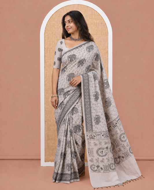 Light Brown South Cotton Saree Features Leaf and Elephant Motifs Print, a Subtle Printed Border, and a Matching Blouse