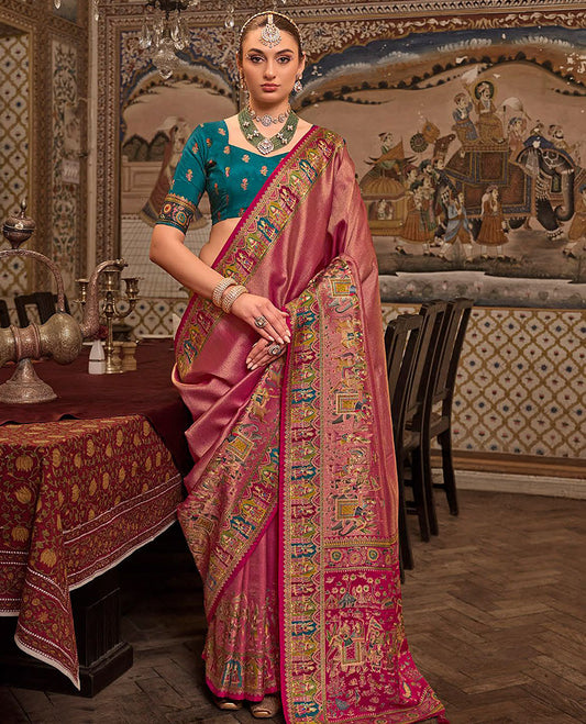 Pink Designer Saree, Gleamed Up with Tissue-Effect All Over Its Body, Complemented by a Colorful Meenakari Mughal-Style Border, Intricately Designed Pallu, and Paired with a Contrast Blouse