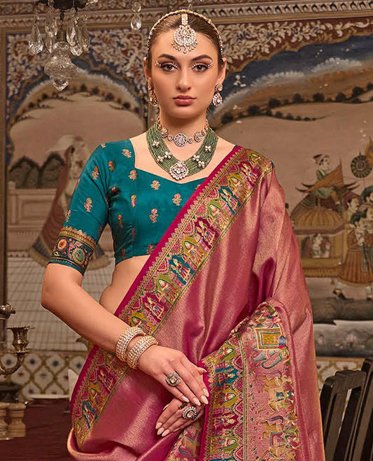 Pink Designer Saree, Gleamed Up with Tissue-Effect All Over Its Body, Complemented by a Colorful Meenakari Mughal-Style Border, Intricately Designed Pallu, and Paired with a Contrast Blouse