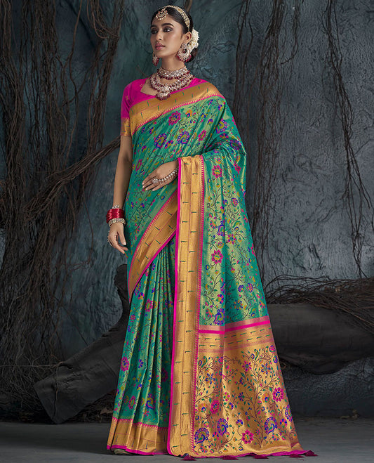 Green Designer Saree, Prettified with Paithani-Style Floral Vine and Peacock Designs All Over Its Body, Complemented by a Contrast Temple Muniya Border, Pallu of Floral Jaal Designs, and Paired with a Contrast Blouse