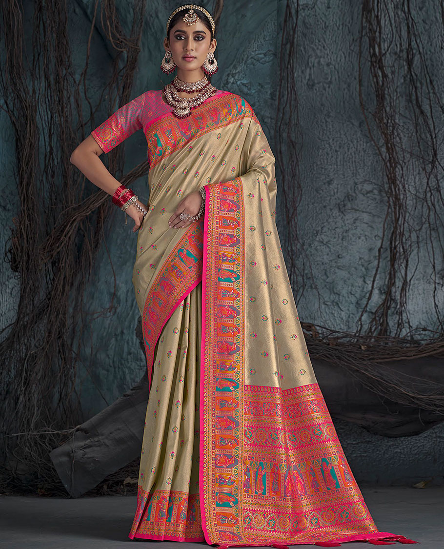 Light Sandal Designer Saree, Subtly Sparkled with Meena Buttas All Over Its Body, Complemented by a Contrast Mughal-Style Human Motifs Border, Pallu of Mughal-Style Designs, and Paired with a Contrast Blouse