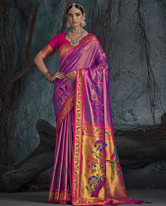 Scintillating Purple Designer Saree, Adorned with Paithani-Style Parrot Designs, Complemented by a Contrast Temple Floral Creeper Border, Pallu of Meenakari Floral and Parrot Designs, and Paired with a Contrast Blouse