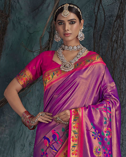 Scintillating Purple Designer Saree, Adorned with Paithani-Style Parrot Designs, Complemented by a Contrast Temple Floral Creeper Border, Pallu of Meenakari Floral and Parrot Designs, and Paired with a Contrast Blouse