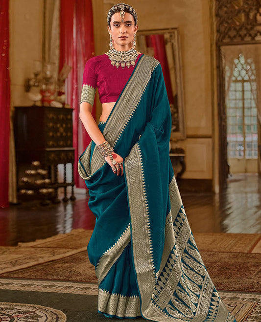 Teal Blue Sparsely Textured Designer Saree, Decorated with Traditional Zari Design Border, Pallu Features Paisley Designs, and Paired with a Contrast Blouse