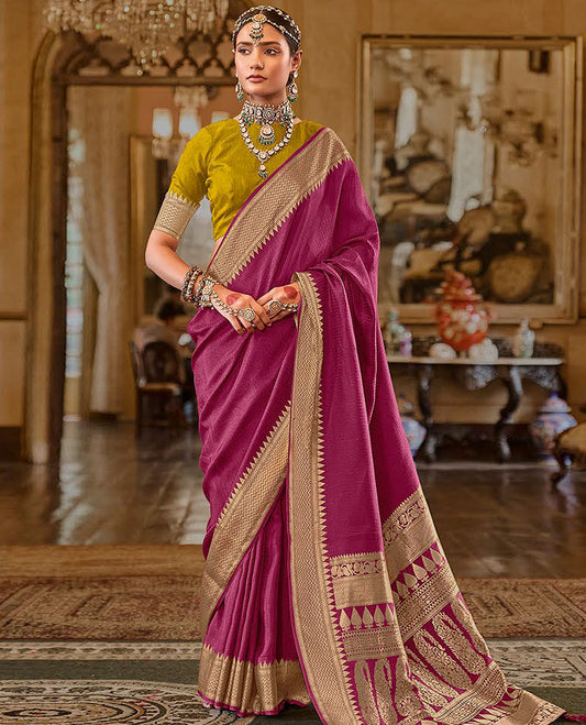 Purple Sparsely Textured Designer Saree, Bedecked with Traditional Zari Design Border, Pallu Features Paisley Designs, and Paired with a Contrast Blouse