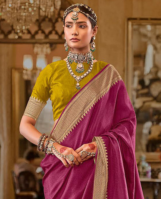 Purple Sparsely Textured Designer Saree, Bedecked with Traditional Zari Design Border, Pallu Features Paisley Designs, and Paired with a Contrast Blouse