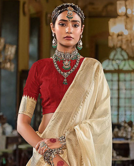 Cream Sparsely Textured Designer Saree, Enthralled with Traditional Zari Design Border, Pallu Features Paisley Designs, and Paired with a Contrast Blouse