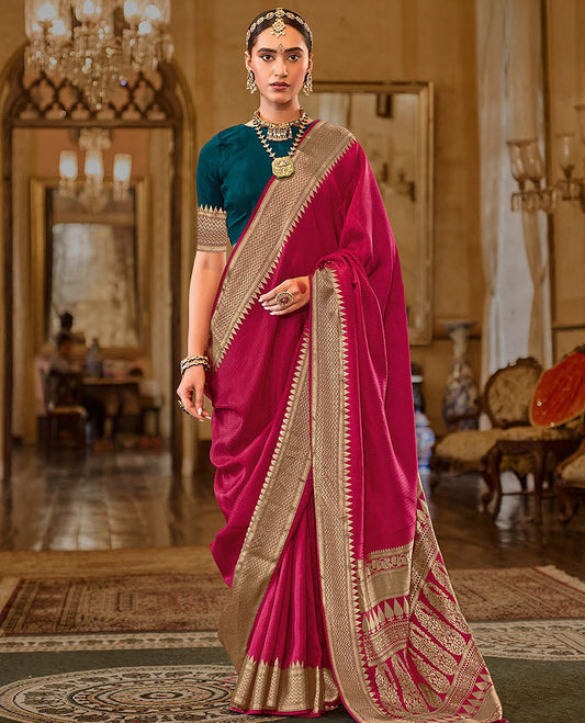 Magenta Sparsely Textured Designer Saree, Ornamented with Traditional Zari Design Border, Pallu Features Paisley Designs, and Paired with a Contrast Blouse