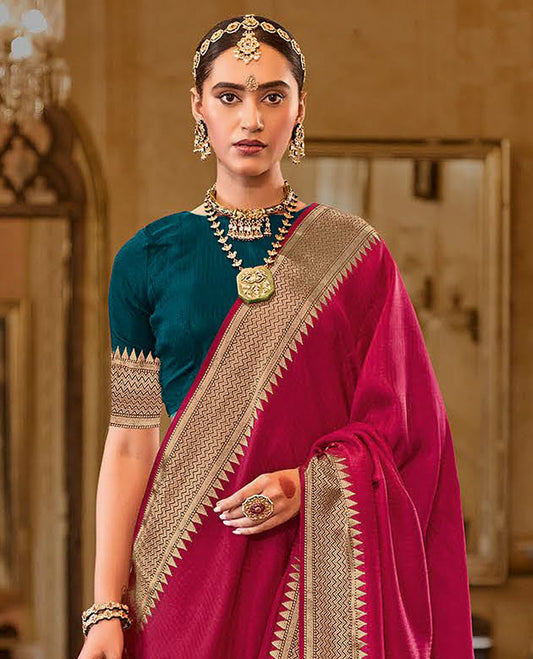 Magenta Sparsely Textured Designer Saree, Ornamented with Traditional Zari Design Border, Pallu Features Paisley Designs, and Paired with a Contrast Blouse