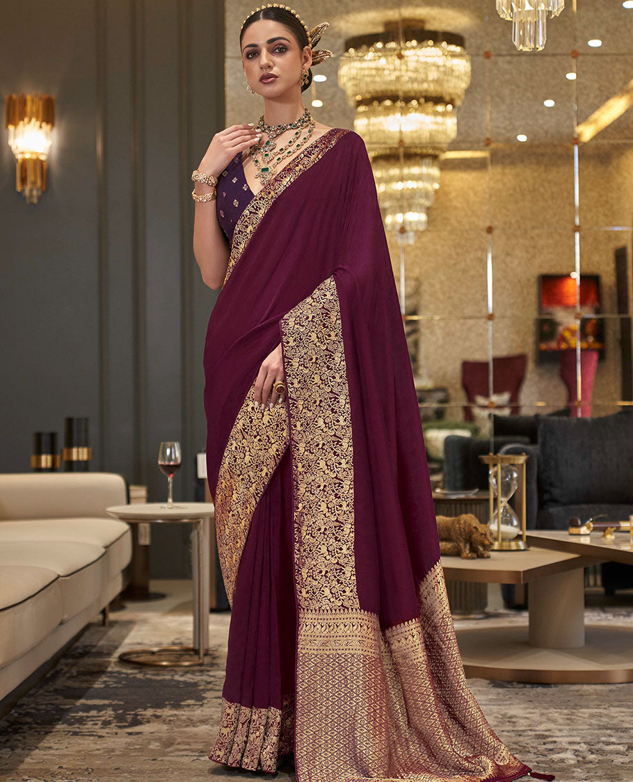 Maroon plain designer saree, self-border, and animal motifs woven pallu
