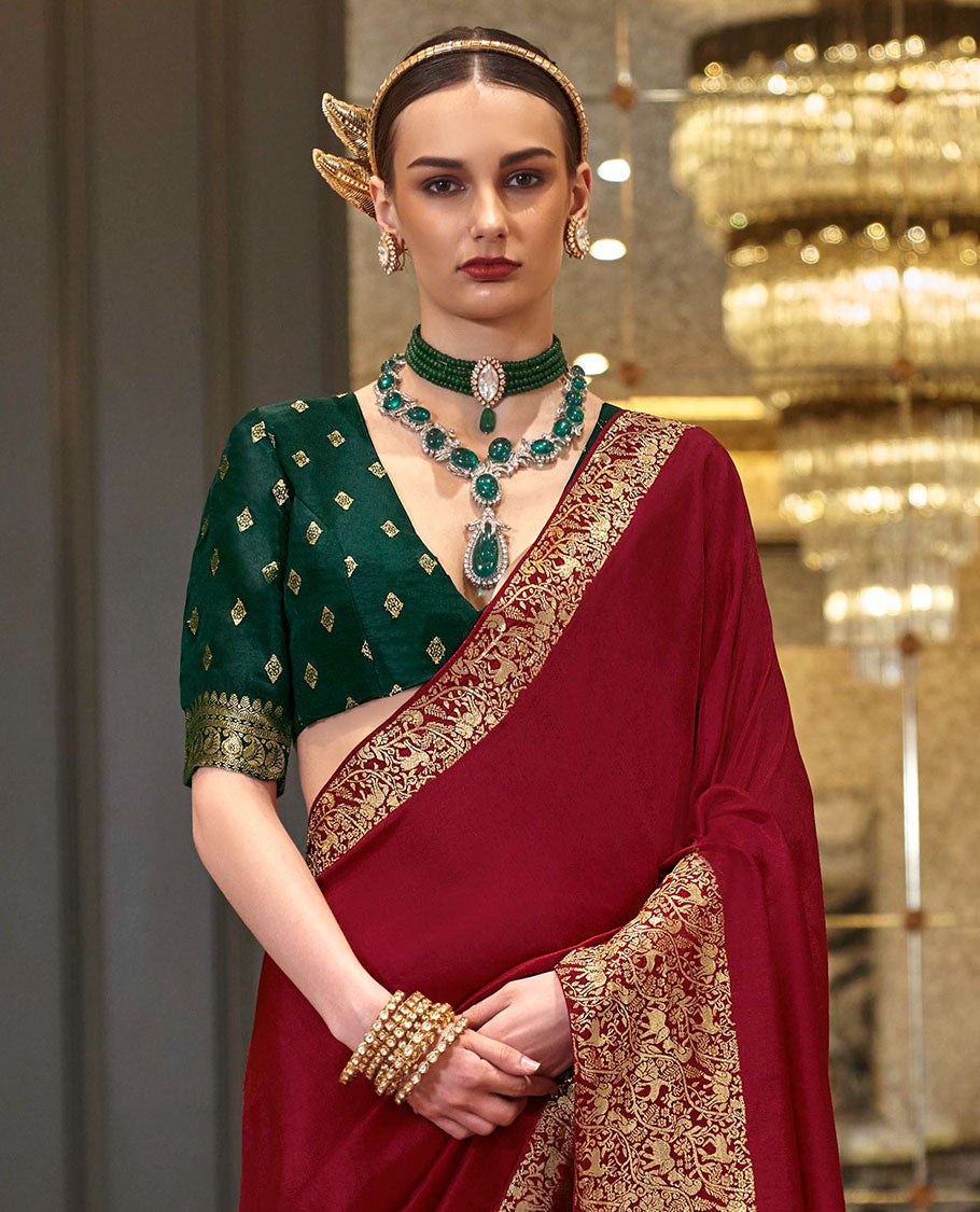 Red plain designer saree, self-border, and animal motifs woven pallu