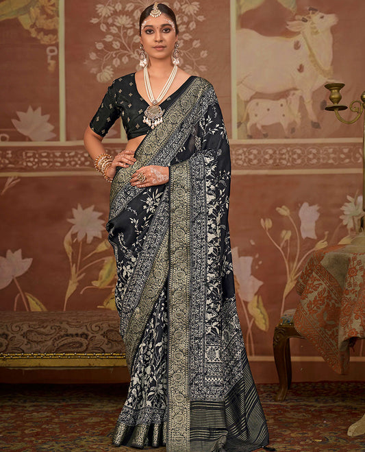 Black floral printed designer saree, floral creeper border, and zari striped pallu