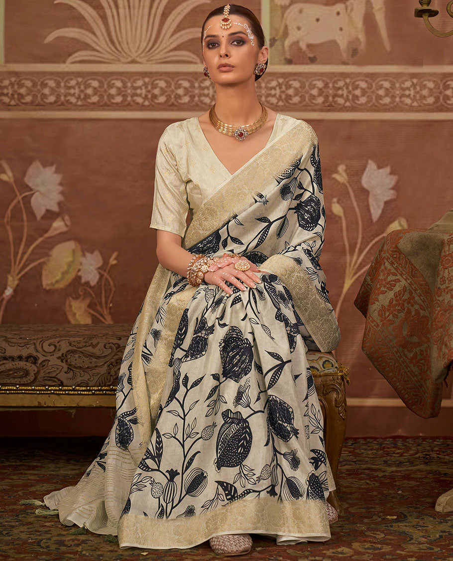 Beige floral vine printed designer saree, floral creeper zari border, and zari striped pallu