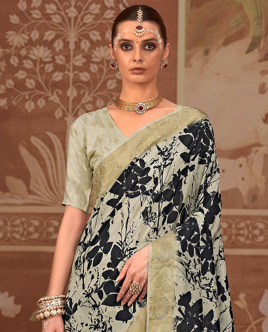 Beige leaf printed designer saree, floral creeper zari border, and zari striped pallu