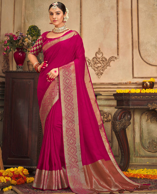 Magenta plain designer saree, patola-style motifs woven border, and zari striped pallu