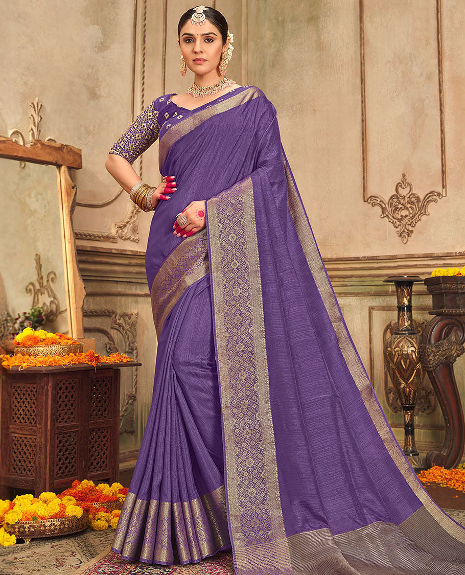 Violet plain designer saree, patola-style motifs woven border, and zari striped pallu