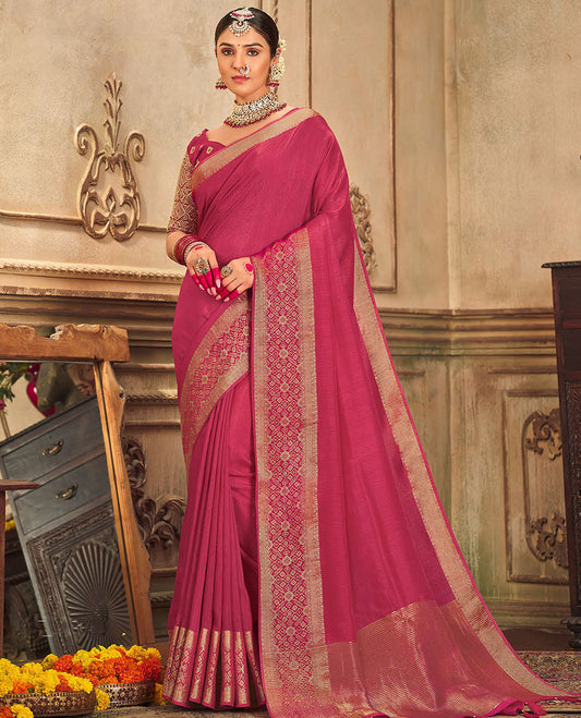 Pink plain designer saree, patola-style motifs woven border, and zari striped pallu