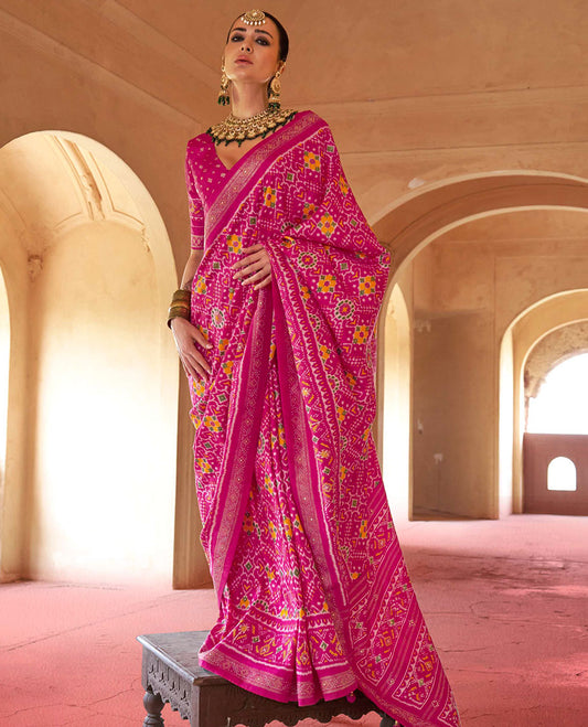 Rani pink double-ikkat patola printed designer catalog saree, stone work border, and patola patterned pallu