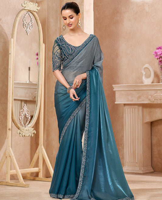Grey Designer Saree Featuring Ombre-Color Dyed All Over the Saree, Decked Up with Embroidered Border, and Comes with a Contrast Intricately Embroidered Blouse