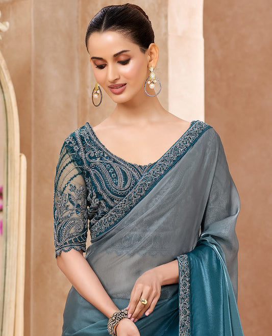 Grey Designer Saree Featuring Ombre-Color Dyed All Over the Saree, Decked Up with Embroidered Border, and Comes with a Contrast Intricately Embroidered Blouse