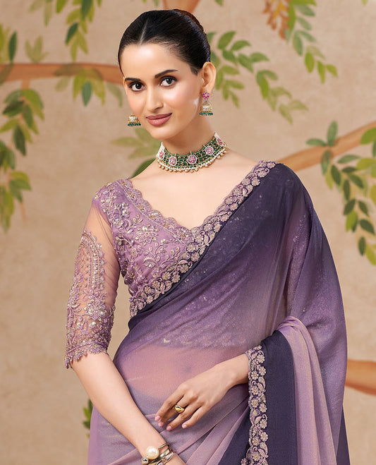 Violet Designer Saree Featuring Ombre-Color Dyed All Over the Saree, Highlighted with Floral Creeper Embroidered Scallop Border, and Comes with a Contrast Floral Embroidered Blouse