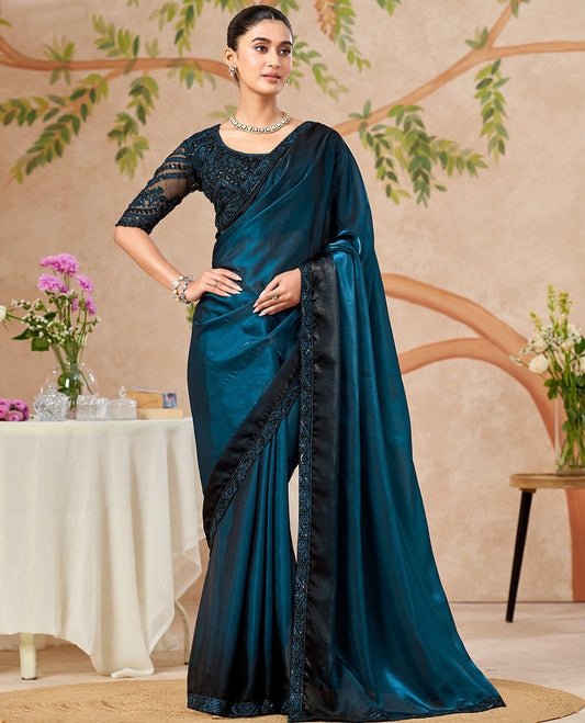 Blue Designer Saree Featuring Ombre-Color Dyed All Over the Saree, Adorned with Floral Embroidered Border, and Comes with a Contrast Intricately Embroidered Blouse