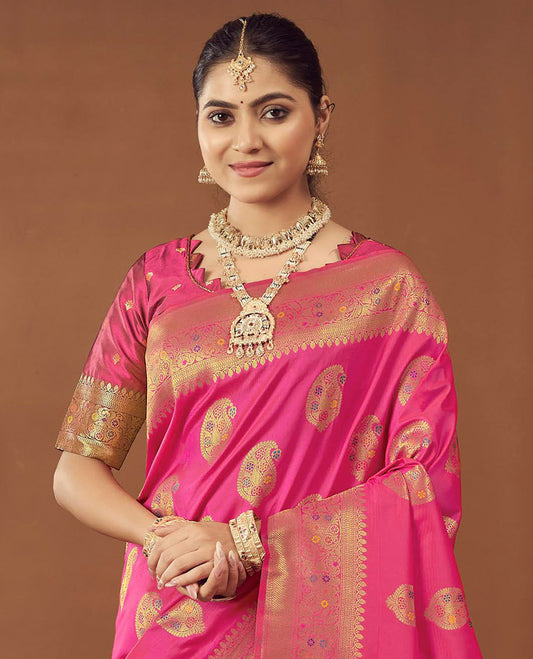 Pink Banaras Designer Catalog Saree, Adorned with Paisley Meena Buttas, Highlighted by a Traditional Meenakari Border, Grand Pallu, and a Matching Blouse