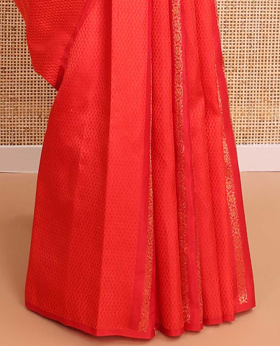 Borderless red geometric design kancheepuram silk saree with intricate floral zari design pallu