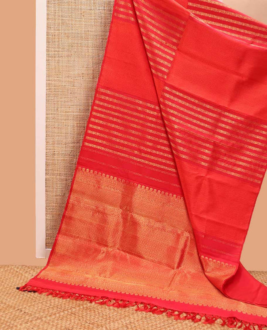 Borderless red geometric design kancheepuram silk saree with intricate floral zari design pallu