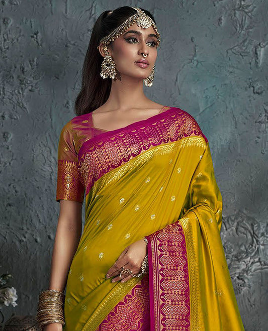 Green Designer Saree, Adorned with Buttas on Its Body, Complemented by a Contrast Border of Geometric Designs, Pallu Depicts Ogee Patterns, and Paired with a Contrast Blouse