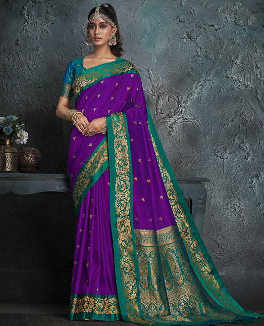 Violet Designer Saree, Bedecked with Buttas on Its Body, Complemented by a Contrast Border of Floral Designs, Pallu of Mughal-Style Intricate Zari Designs, and Paired with a Contrast Blouse