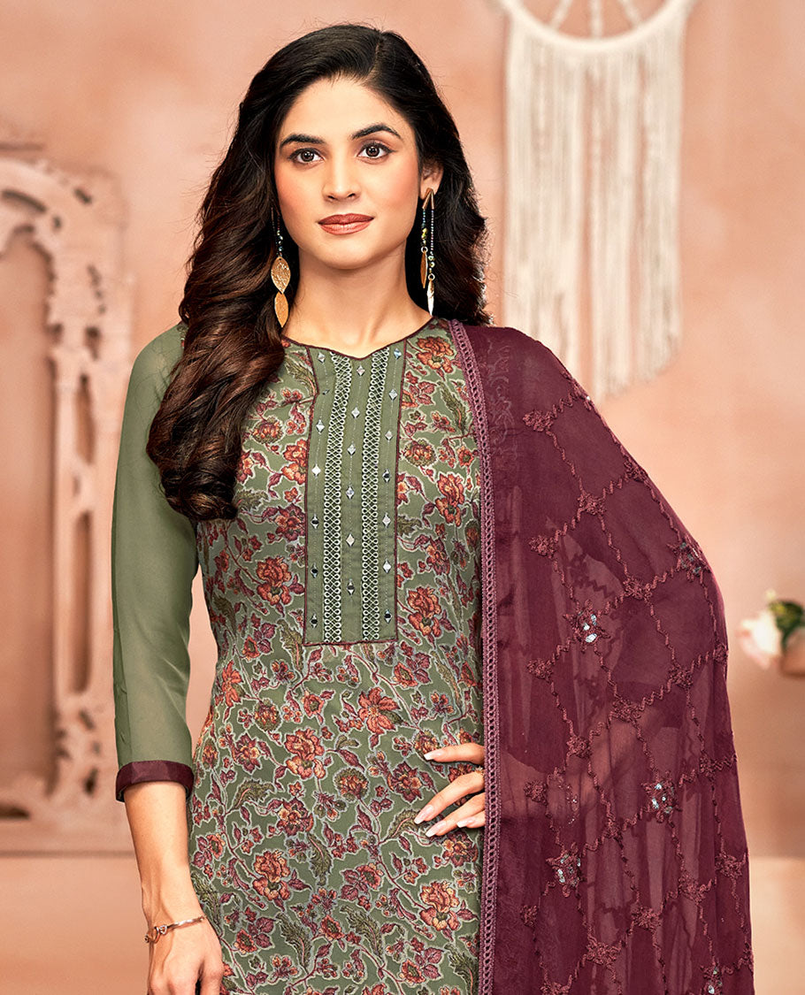 Green material chudidar set, floral print and neck work top, contrast plain bottom, and jaal embroidered dupatta