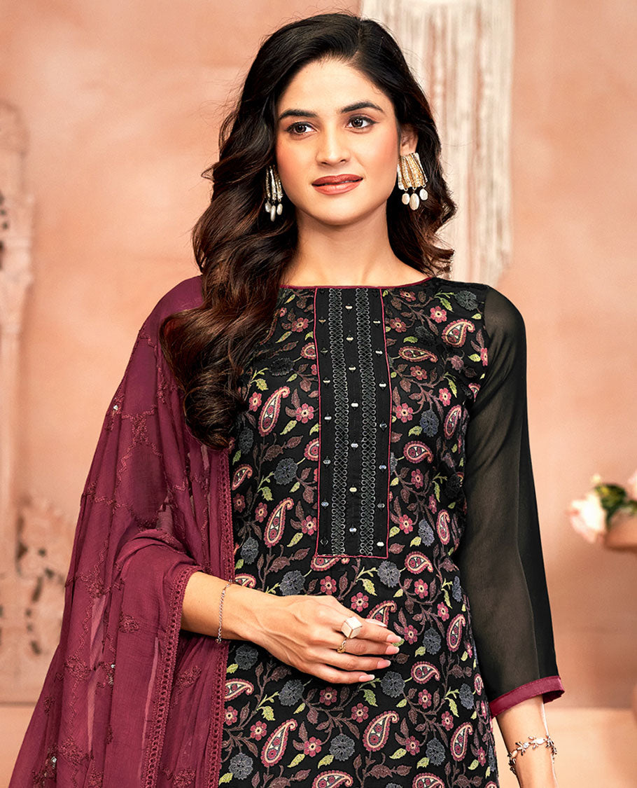 Black material chudidar set, paisley vine print and neck work top, contrast plain bottom, and jaal embroidered dupatta