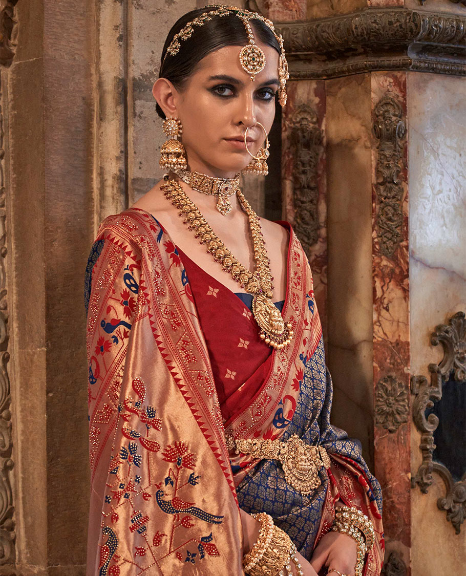Navy blue jacquard designer catalog saree, contrast paithani temple and peacock motifs border, and pallu of paithani designs
