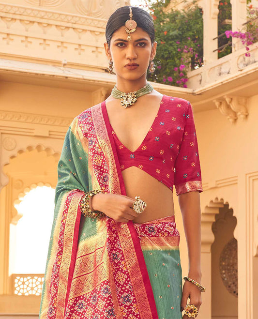 Rama Ikat Patola Designer Saree, Subtly Woven with Ikat Buttas, Complemented by a Contrast Ikat Border, Intricate Pallu, and a Contrast Blouse