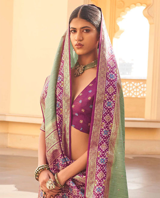 Pista Green Ikat Patola Designer Saree, Subtly Woven with Ikat Buttas, Complemented by a Contrast Ikat Border, Intricate Pallu, and a Contrast Blouse