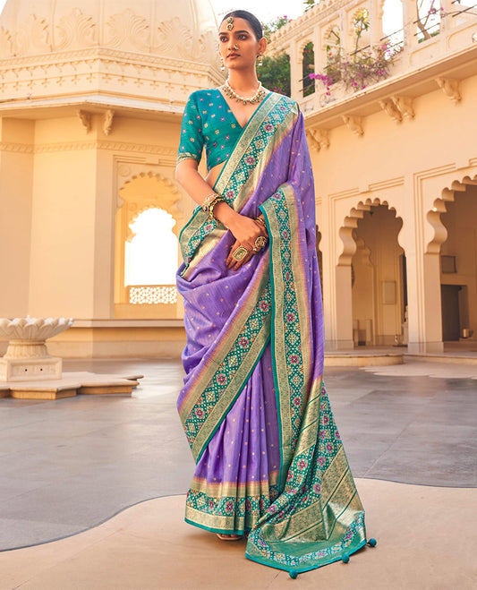 Lavender Ikat Patola Designer Saree, Subtly Woven with Ikat Buttas, Complemented by a Contrast Ikat Border, Intricate Pallu, and a Contrast Blouse